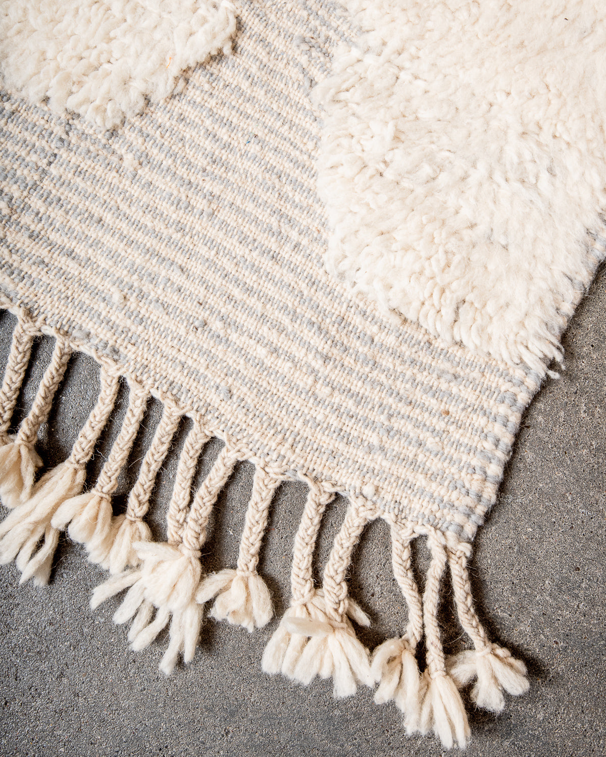 Modern, designer, handcrafted Berber rug from Morocco. Beniourain carpet with beautiful colours and patterns and fluffy wool texture.